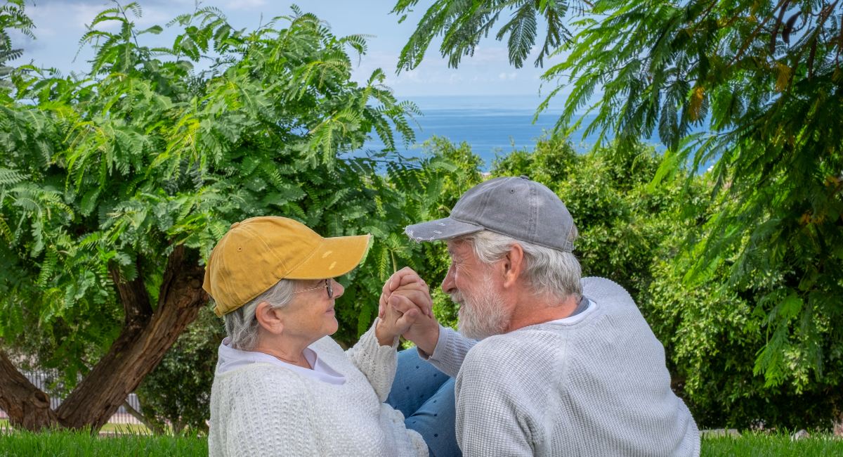 Mature couple spending time together in a tropical Caribbean location as they enjoy retirement in Barbados